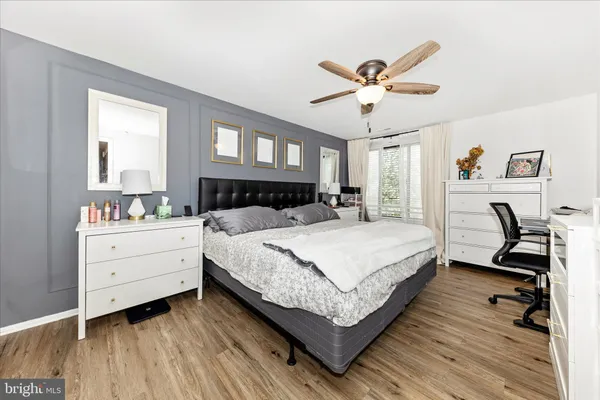 a bed room with a bed and a window