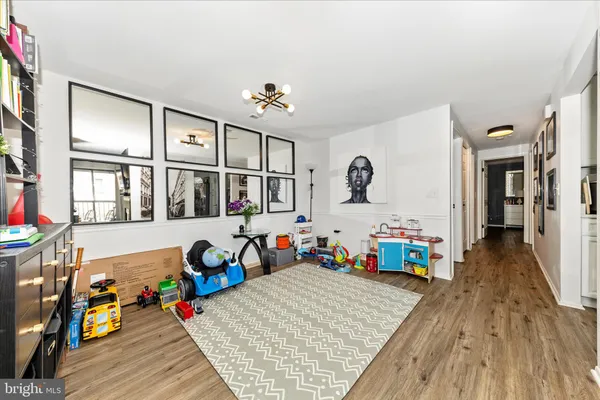 a very nice looking living room with furniture and a large window