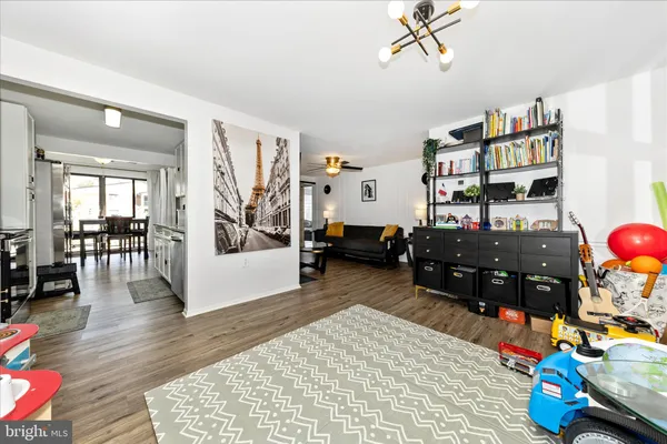 a bedroom with furniture and a book shelf
