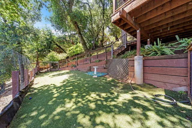 a backyard of a house with lots of green space