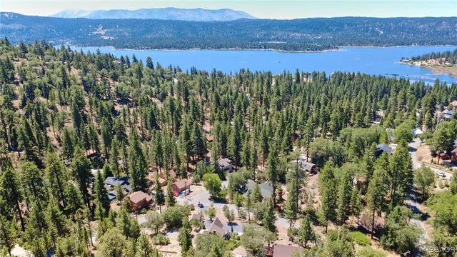 a view of a lake with mountains in the background