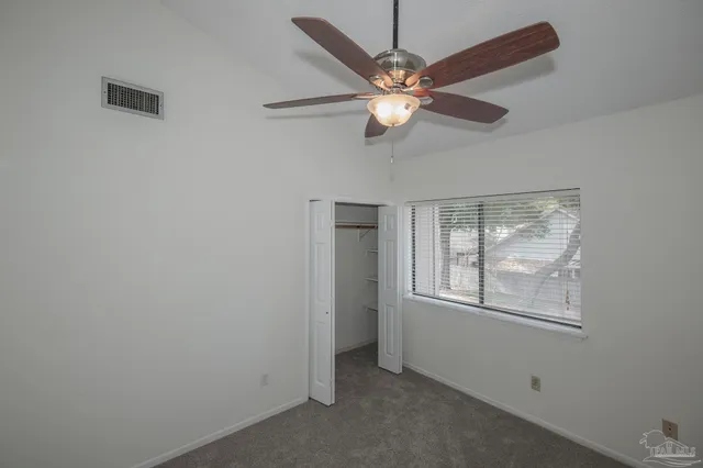 en view of an empty room with a window