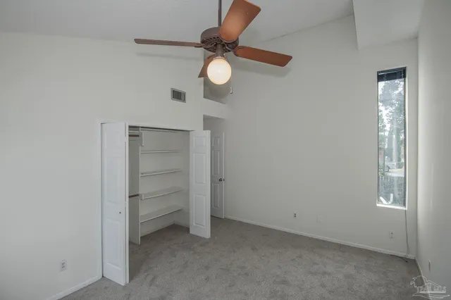 a view of storage and utility room with washer and dryer