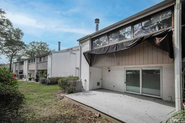 a view of a backyard of the house