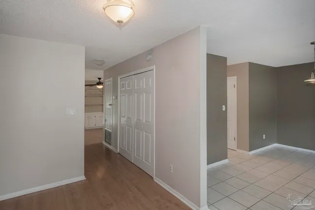 a view of a room with a wardrobe space