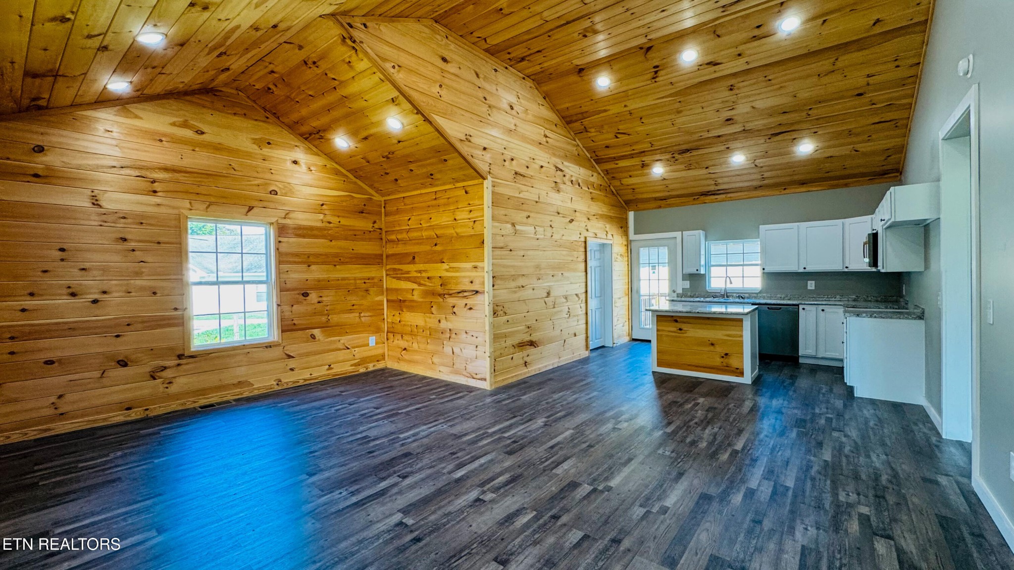 138 Lloyd Street Oneida, TN 37841 - Photo 11 of 36 a room with stainless steel appliances wooden floors and view living room