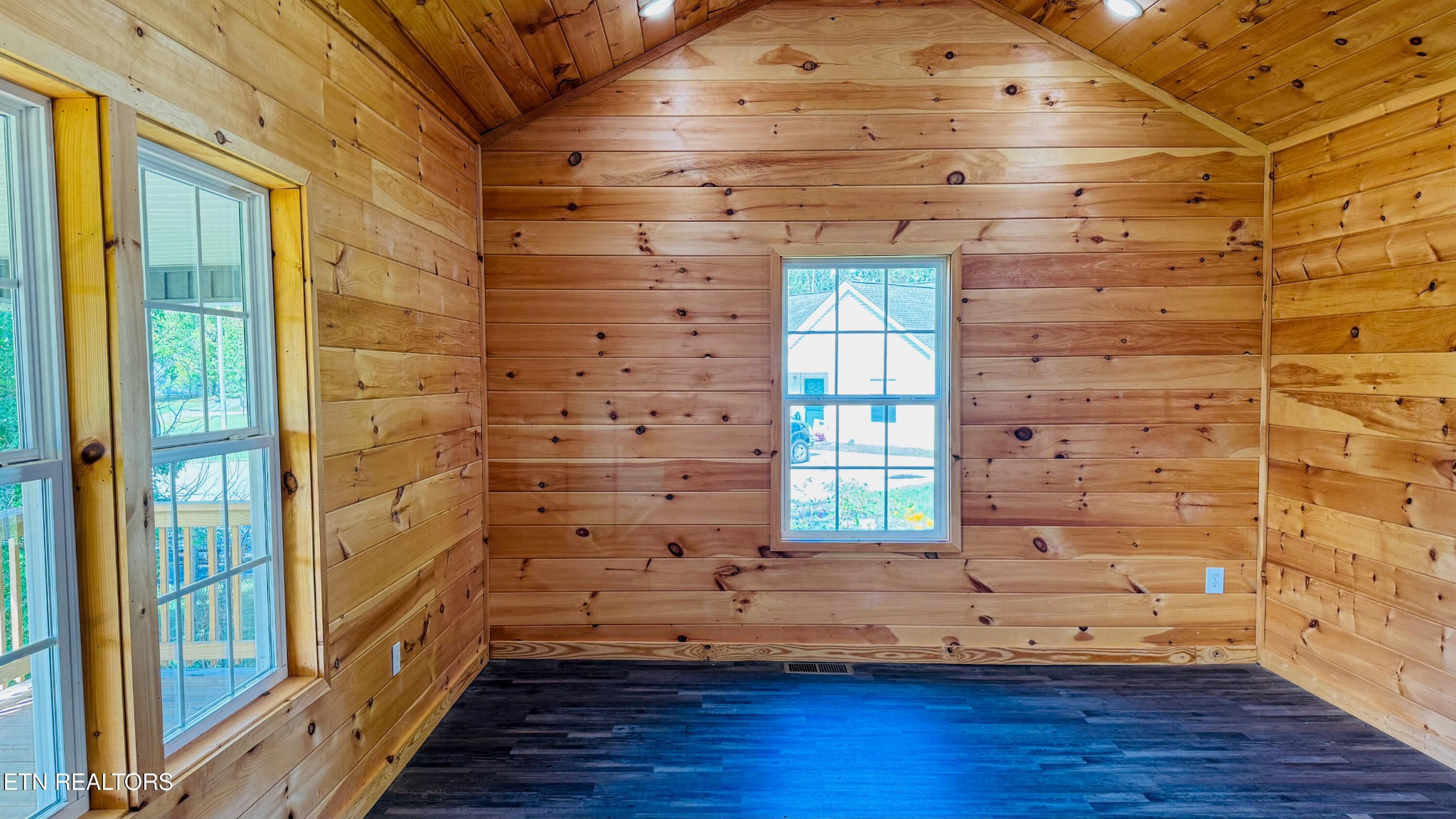 138 Lloyd Street Oneida, TN 37841 - Photo 14 of 36 a view of empty room with wooden floor and fan
