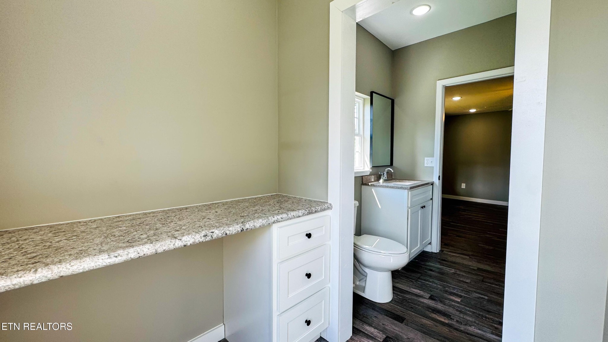 138 Lloyd Street Oneida, TN 37841 - Photo 23 of 36 a bathroom with a granite countertop sink toilet and shower