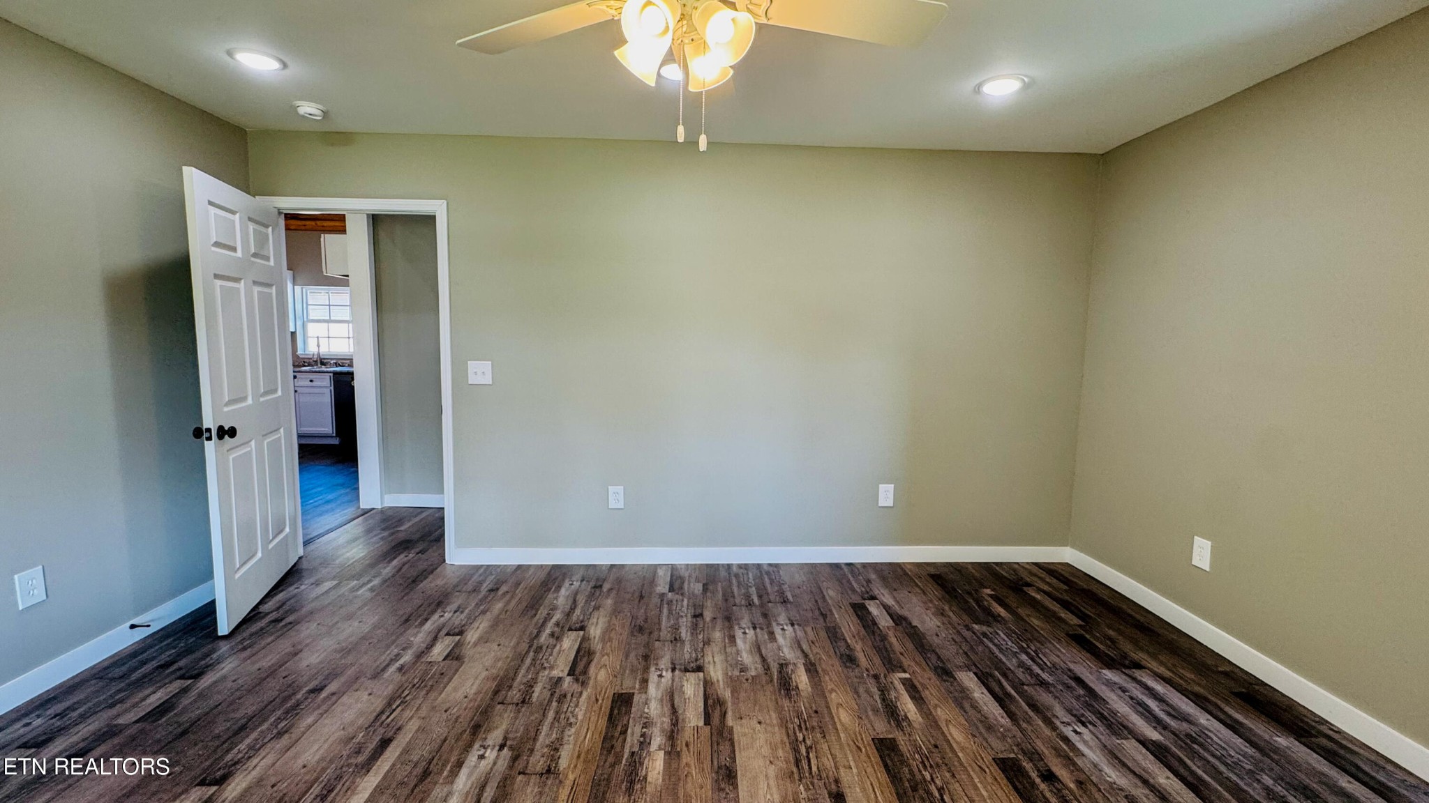 138 Lloyd Street Oneida, TN 37841 - Photo 27 of 36 a view of a room with wooden floor
