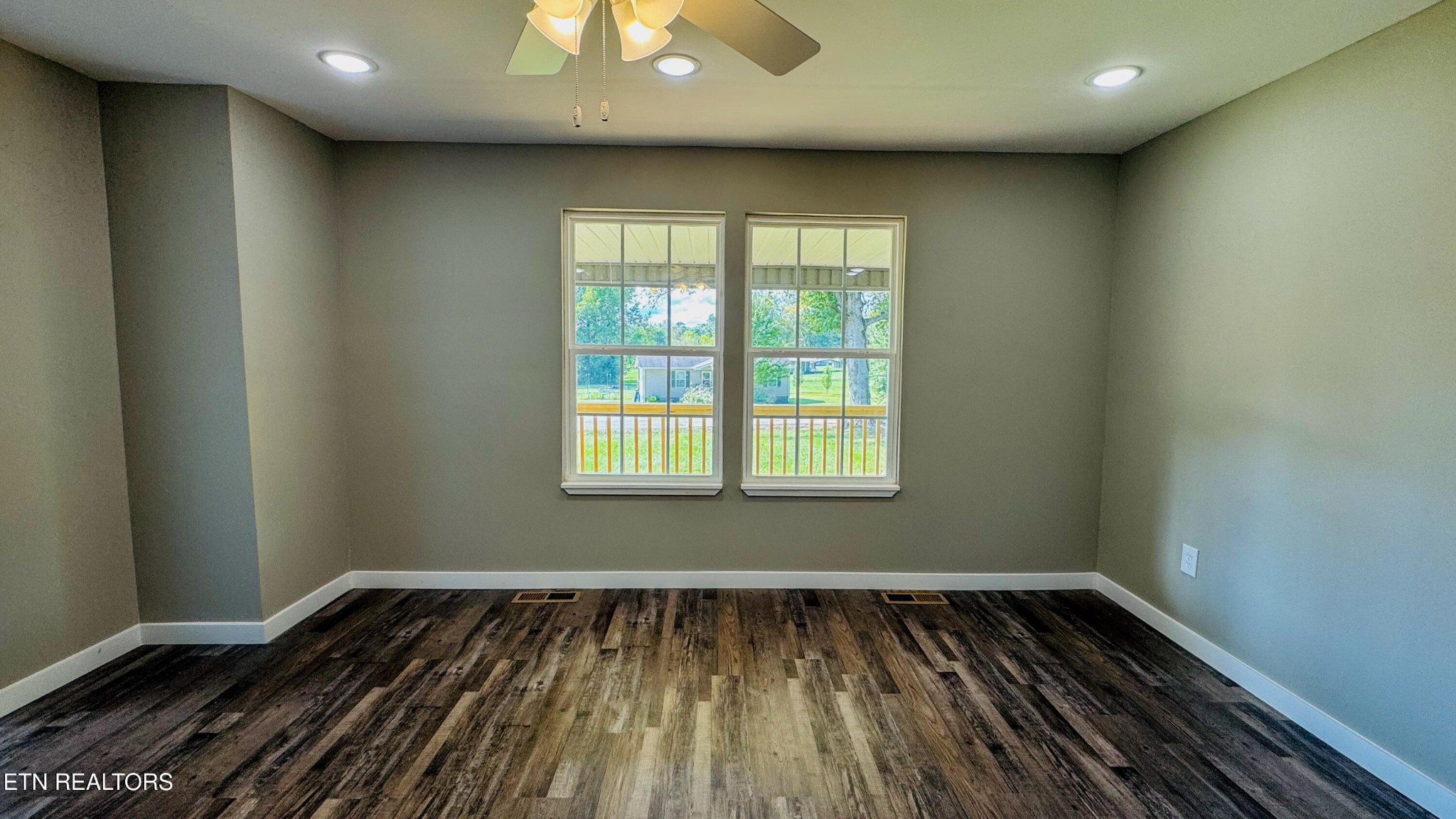138 Lloyd Street Oneida, TN 37841 - Photo 28 of 36 a view of wooden floor and chandelier in a room