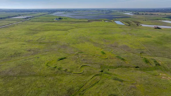 a view of an empty room with a sink