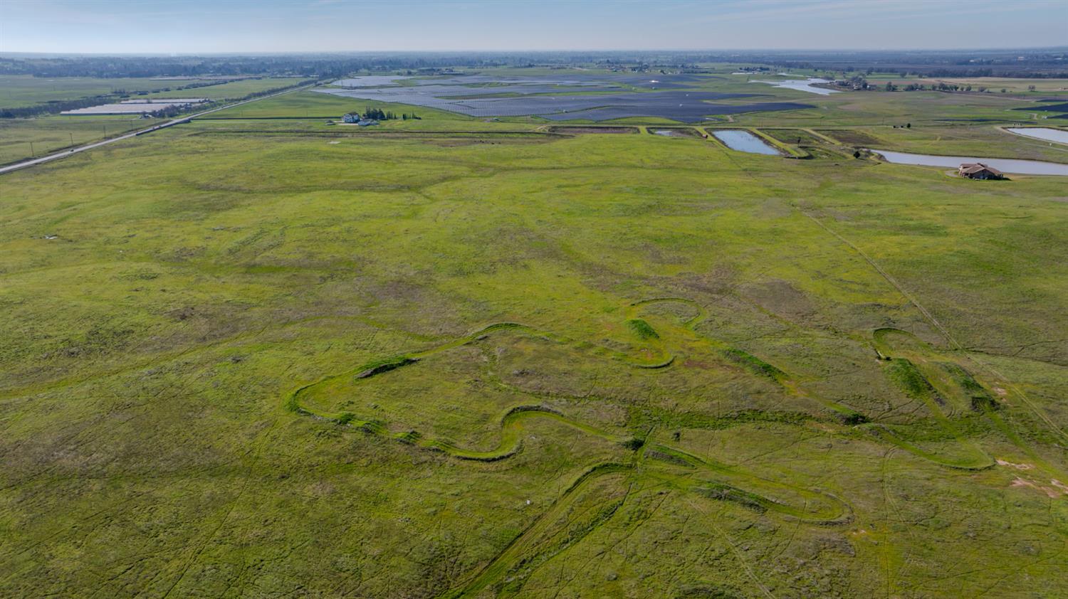 a view of an empty room with a sink
