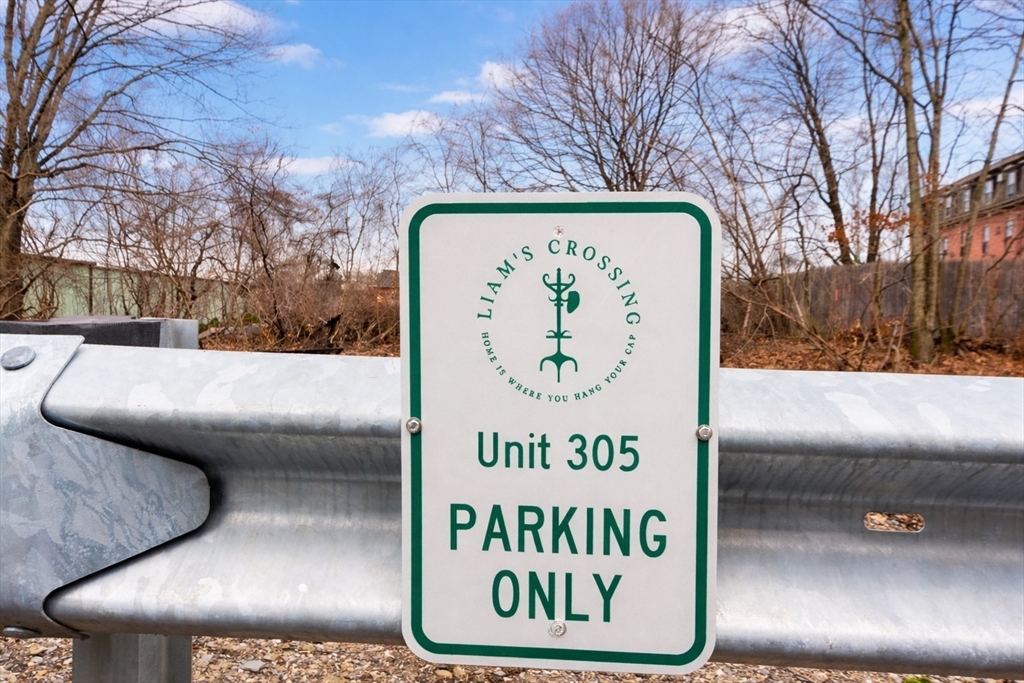 55 Sterling Street, Unit 305 Clinton, MA 01510 - Photo 26 of 31 a view of outdoor space with sign board