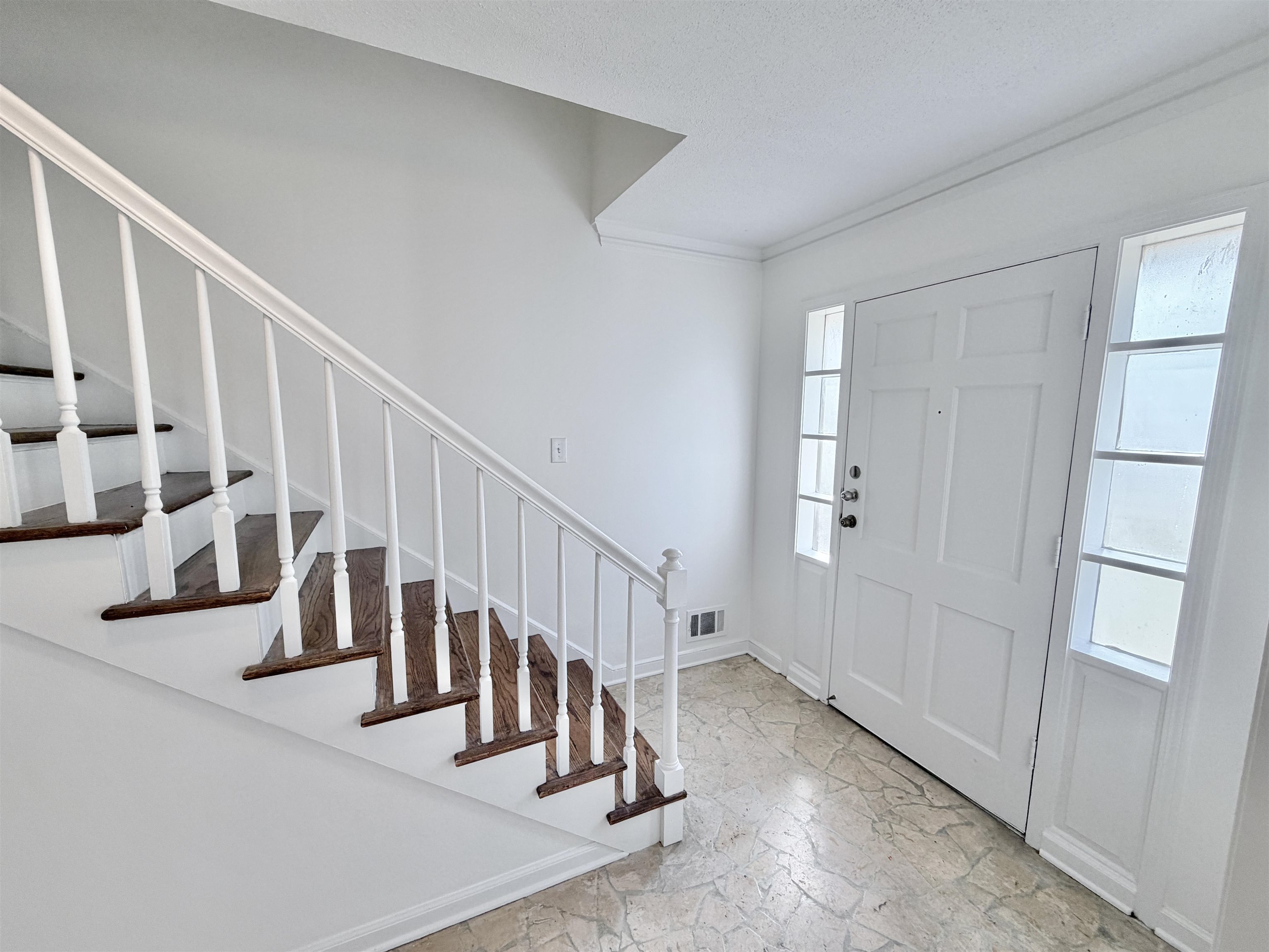 3118 Estes Street Memphis, TN 38115 - Photo 13 of 32 a view of entryway with wooden floor