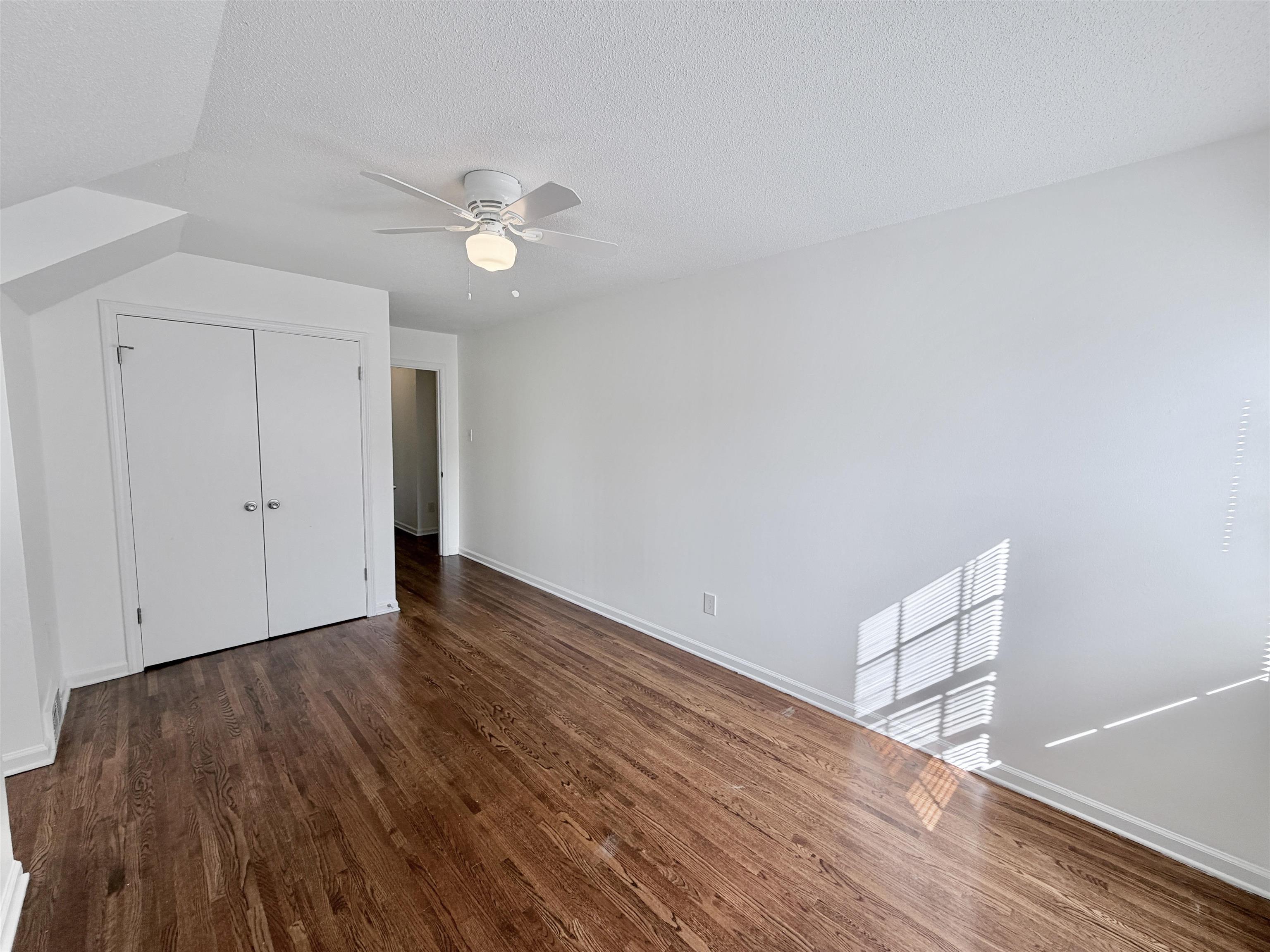 3118 Estes Street Memphis, TN 38115 - Photo 18 of 32 a view of an empty room with wooden floor