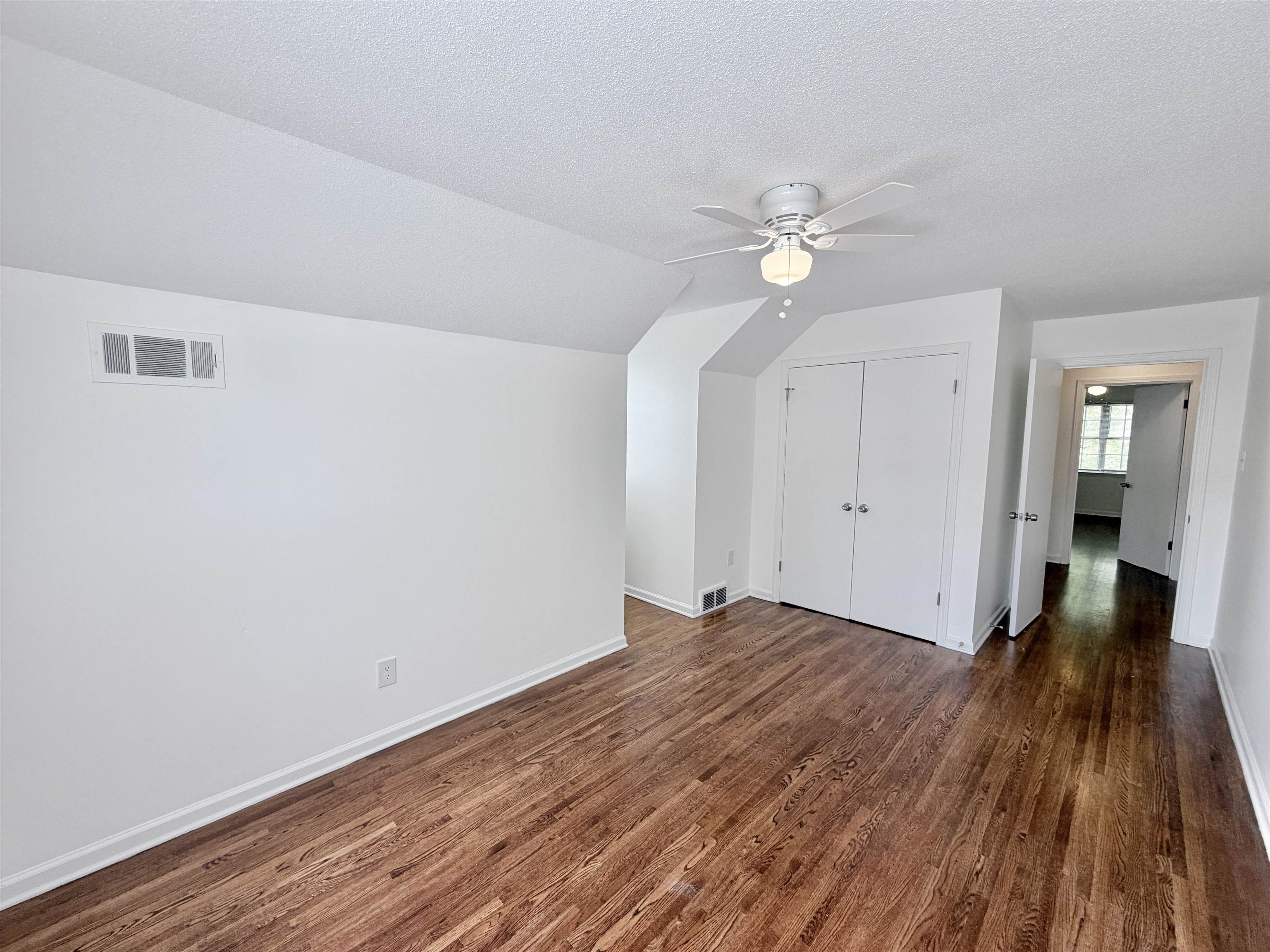 3118 Estes Street Memphis, TN 38115 - Photo 19 of 32 wooden floor in an empty room with a window