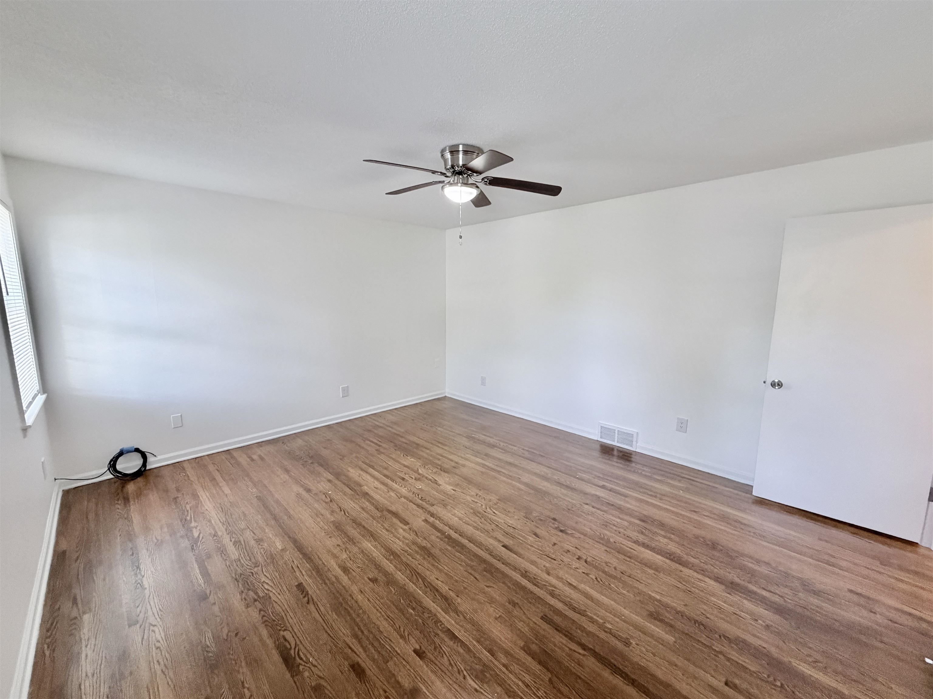 3118 Estes Street Memphis, TN 38115 - Photo 22 of 32 a view of empty room with wooden floor