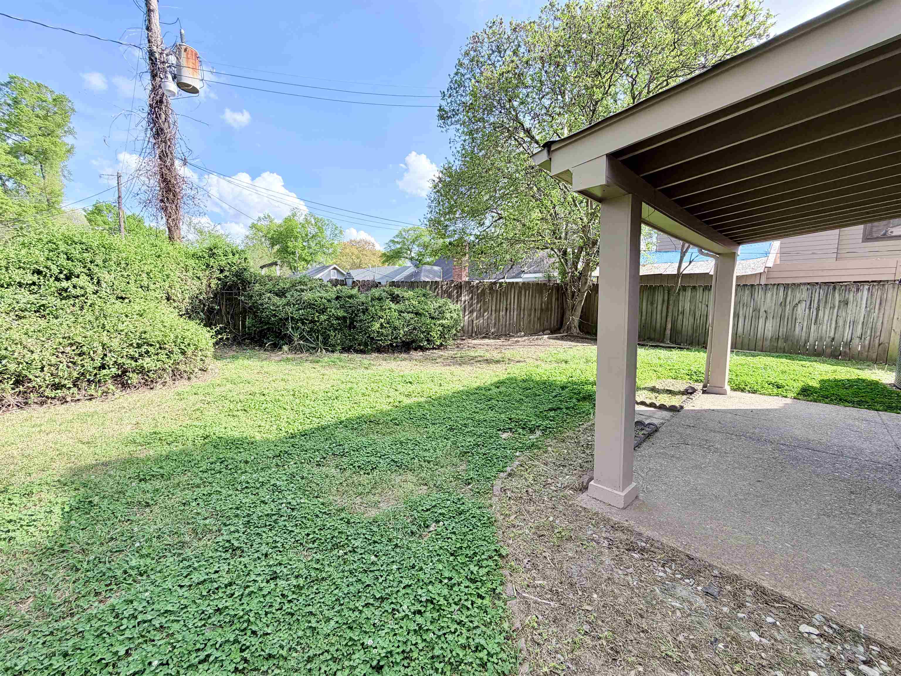3118 Estes Street Memphis, TN 38115 - Photo 30 of 32 a view of a backyard with a garden
