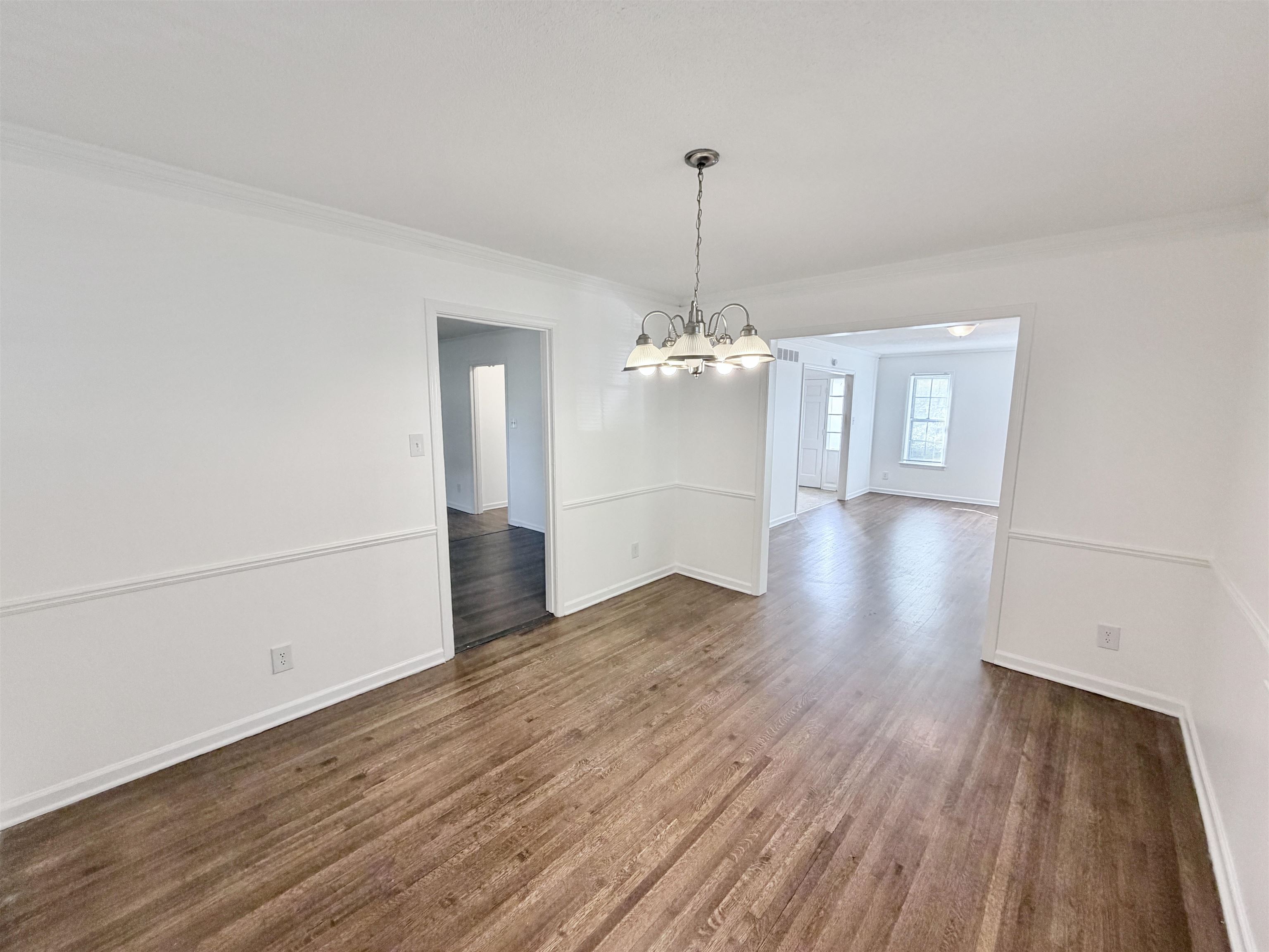 3118 Estes Street Memphis, TN 38115 - Photo 4 of 32 a view of a livingroom with wooden floor