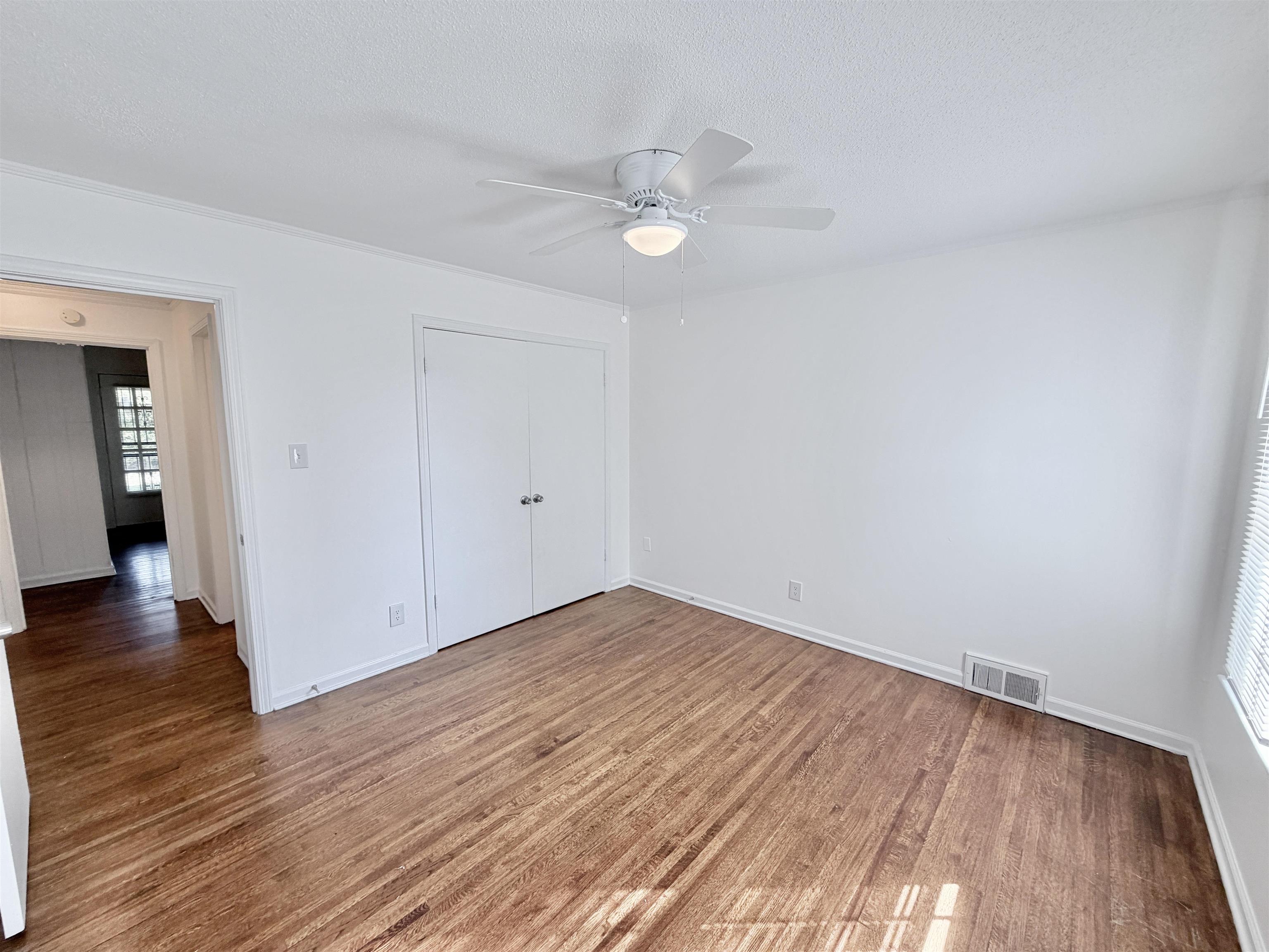 3118 Estes Street Memphis, TN 38115 - Photo 5 of 32 a view of empty room with wooden floor