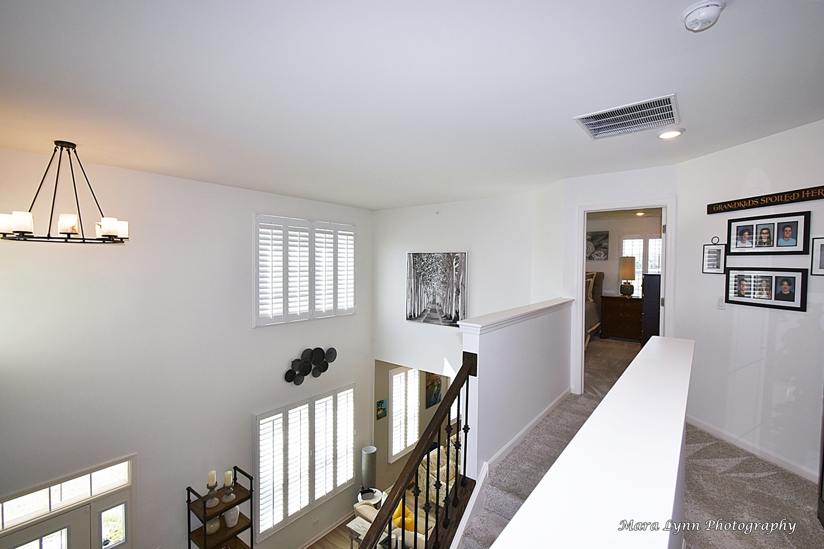 2085 Stuttle Road Batavia, IL 60510 - Photo 14 of 25 a view of a hallway with windows and hardwood floor