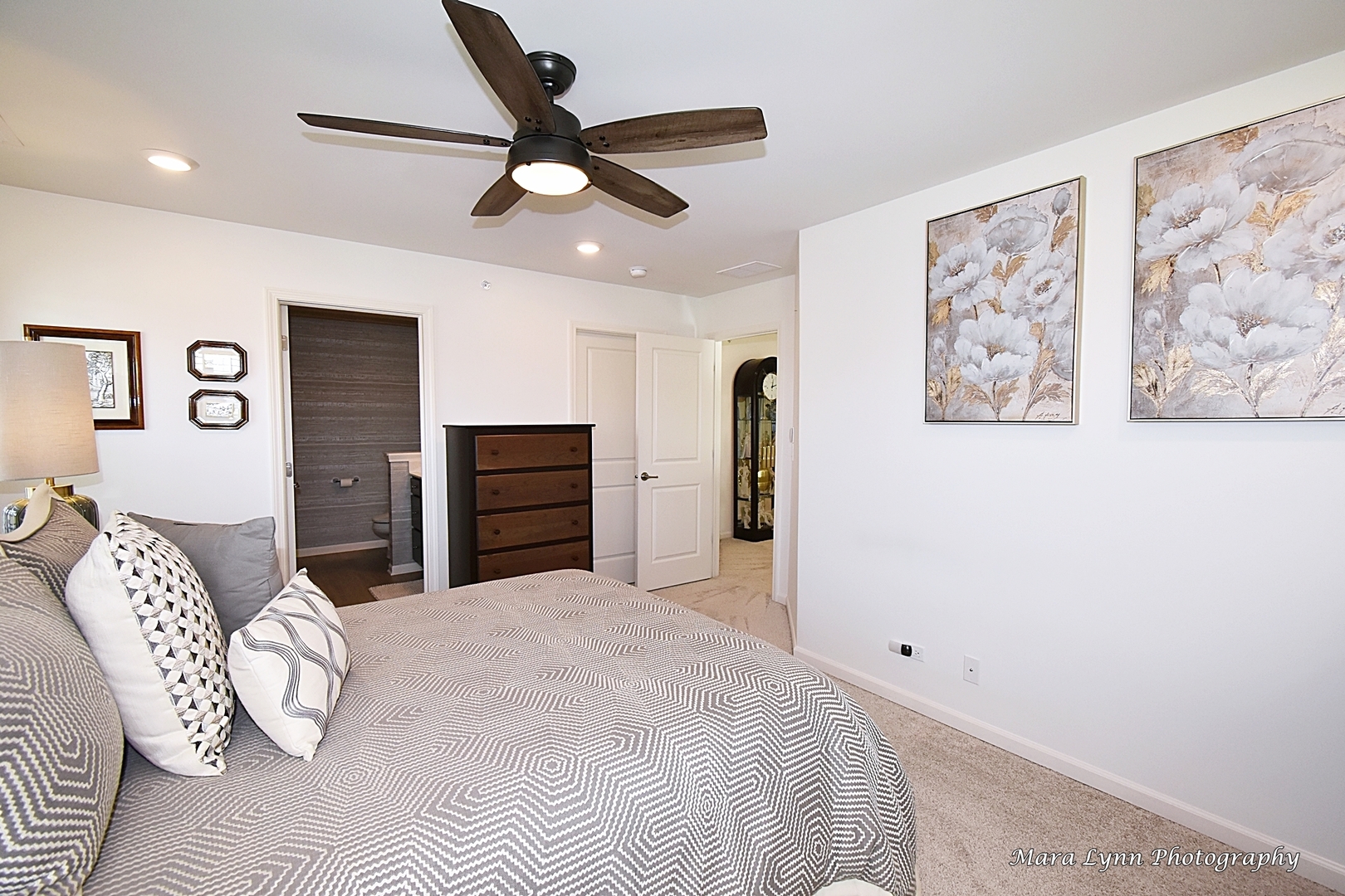 2085 Stuttle Road Batavia, IL 60510 - Photo 16 of 25 a bedroom with a large bed and a ceiling fan