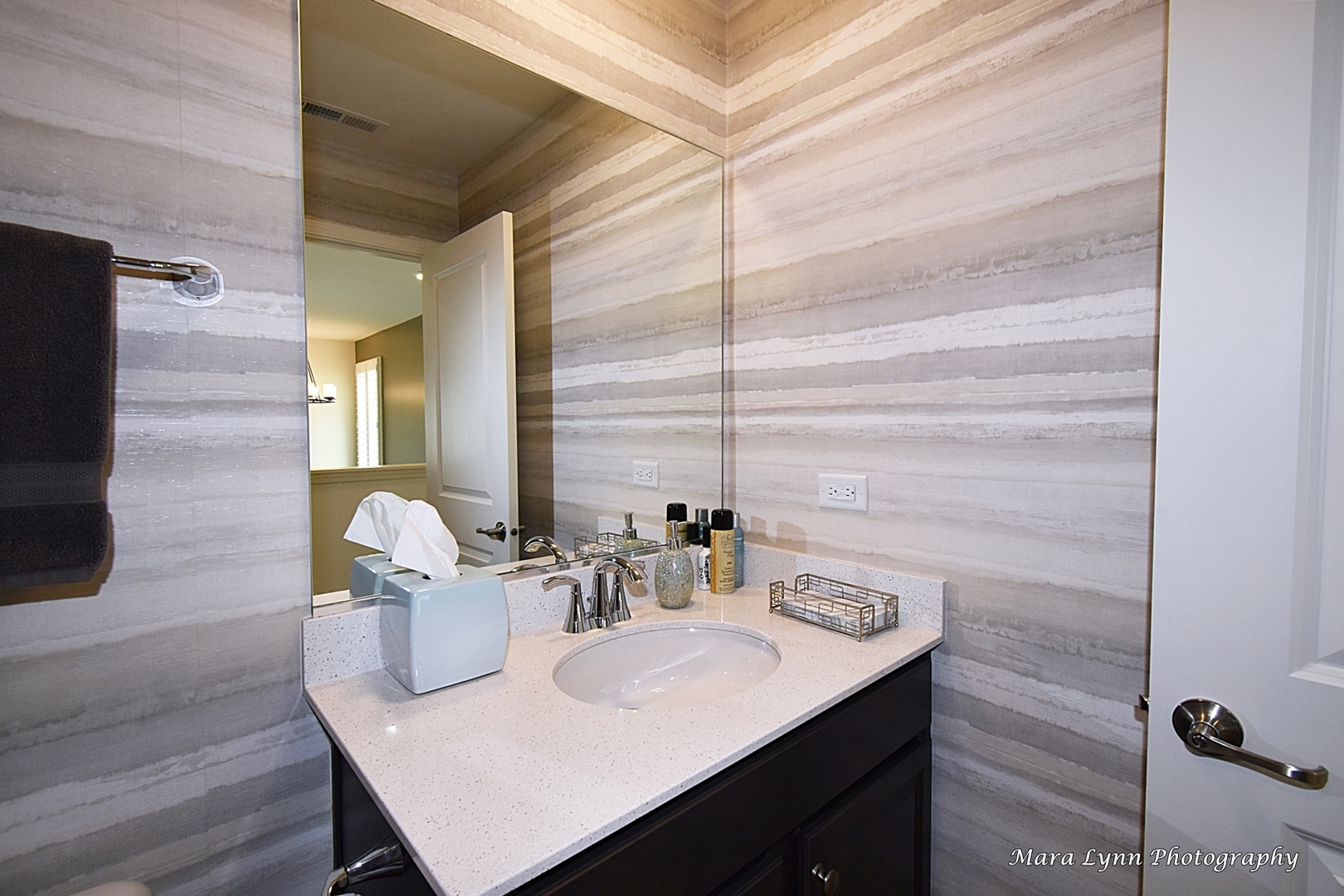 2085 Stuttle Road Batavia, IL 60510 - Photo 21 of 25 a bathroom with a sink and a mirror
