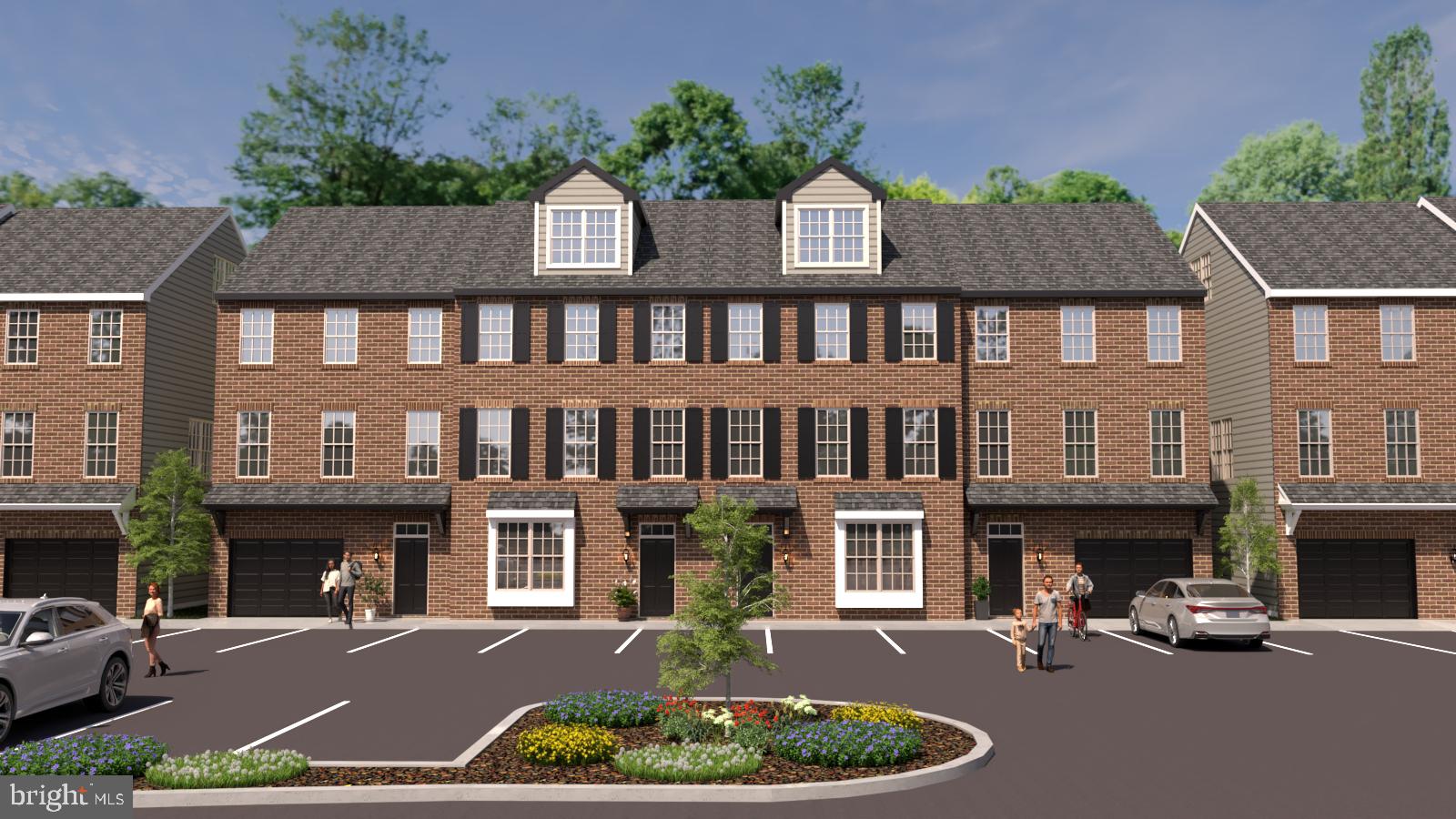 a front view of a house with yard and parking