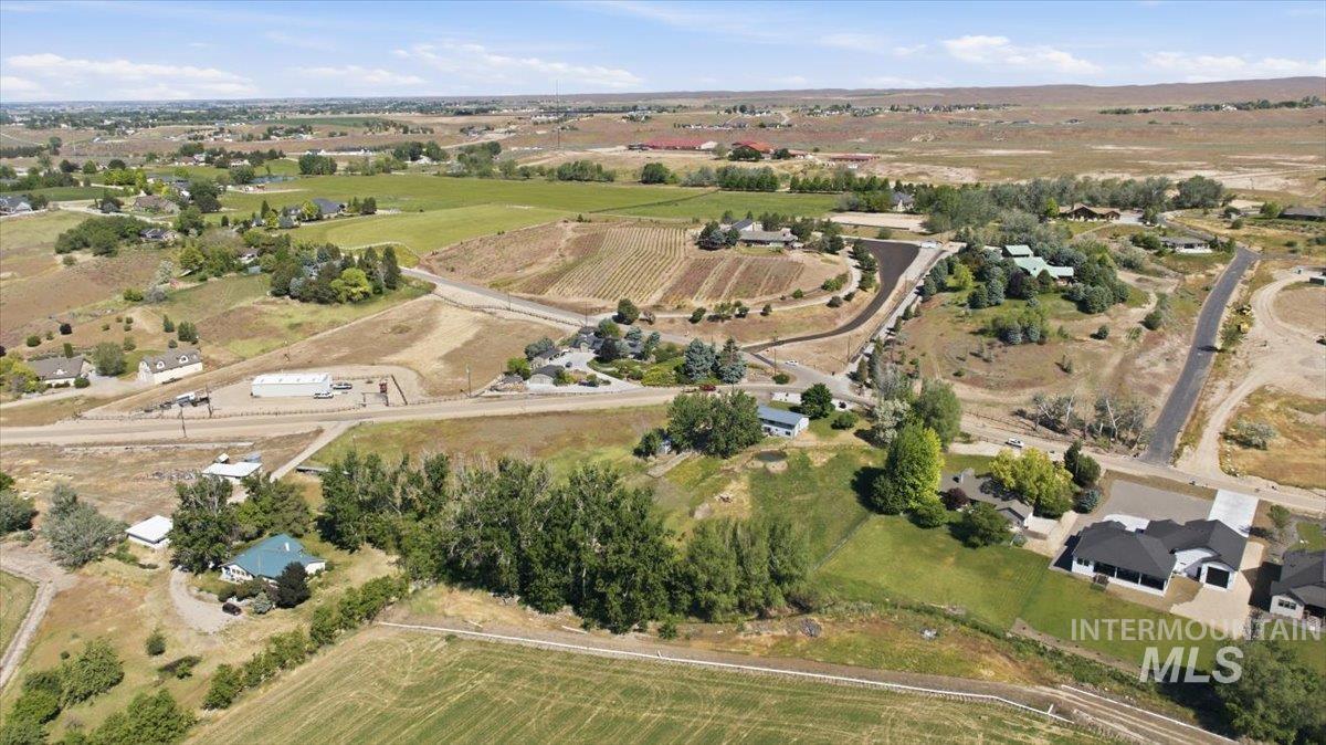 6323 Foothill Road Star, ID 83669 - Photo 47 of 50 Expansive aerial perspective showcasing diverse terrain with residential properties, agricultural fields, and natural vegetation