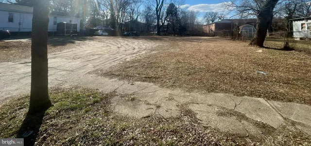 a view of a backyard of the house