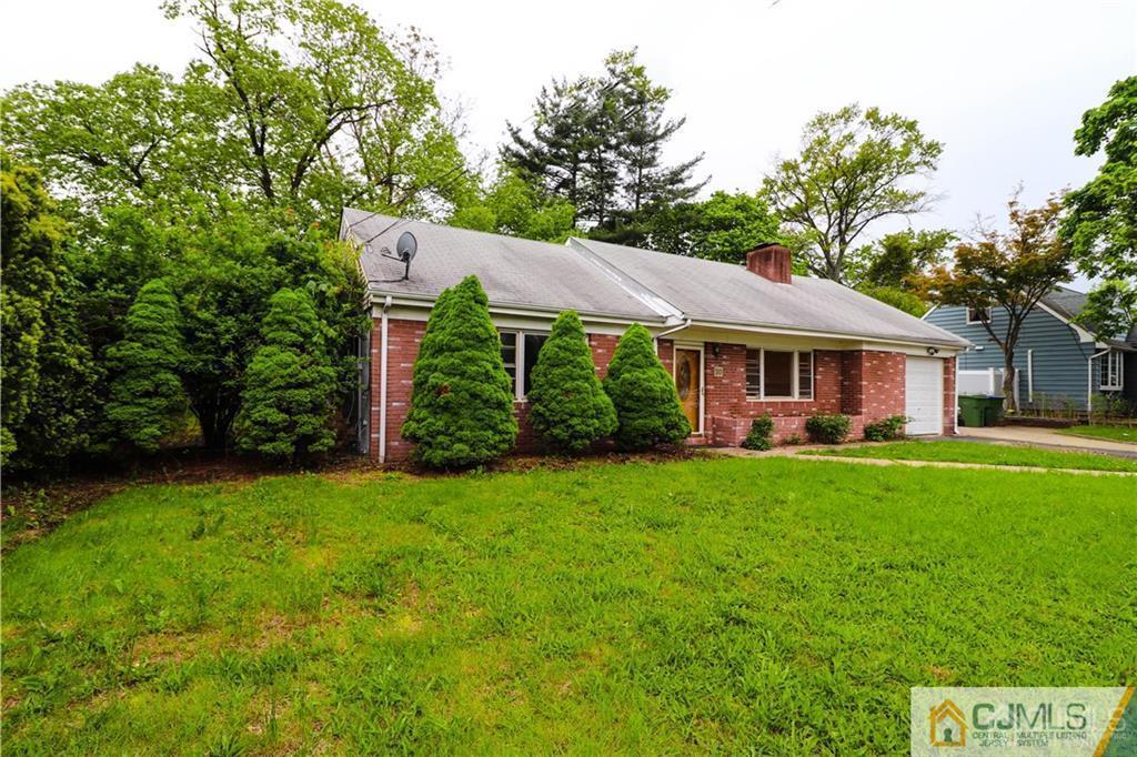 20 Old Post Road Edison, NJ 08817 - Photo 22 of 25 a view of a house with backyard and garden