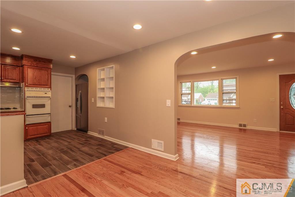 20 Old Post Road Edison, NJ 08817 - Photo 3 of 25 a view of empty room with wooden floor