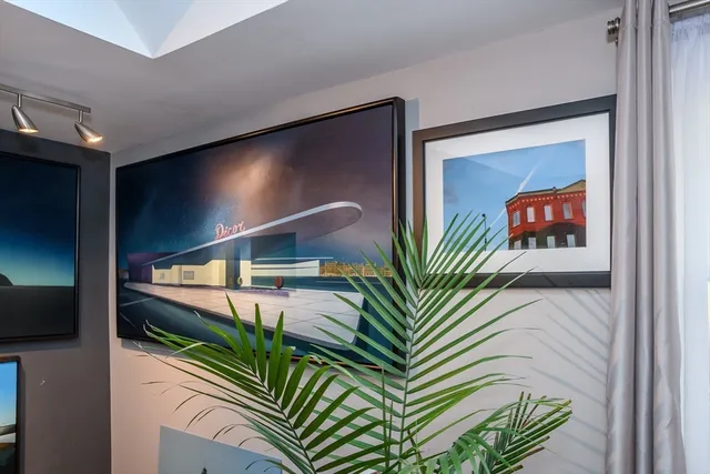 a view of living room with a fireplace