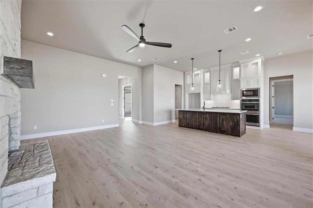 108 Rocky Top Azle, TX 76020 - Photo 5 of 40 a view of kitchen with wooden floor