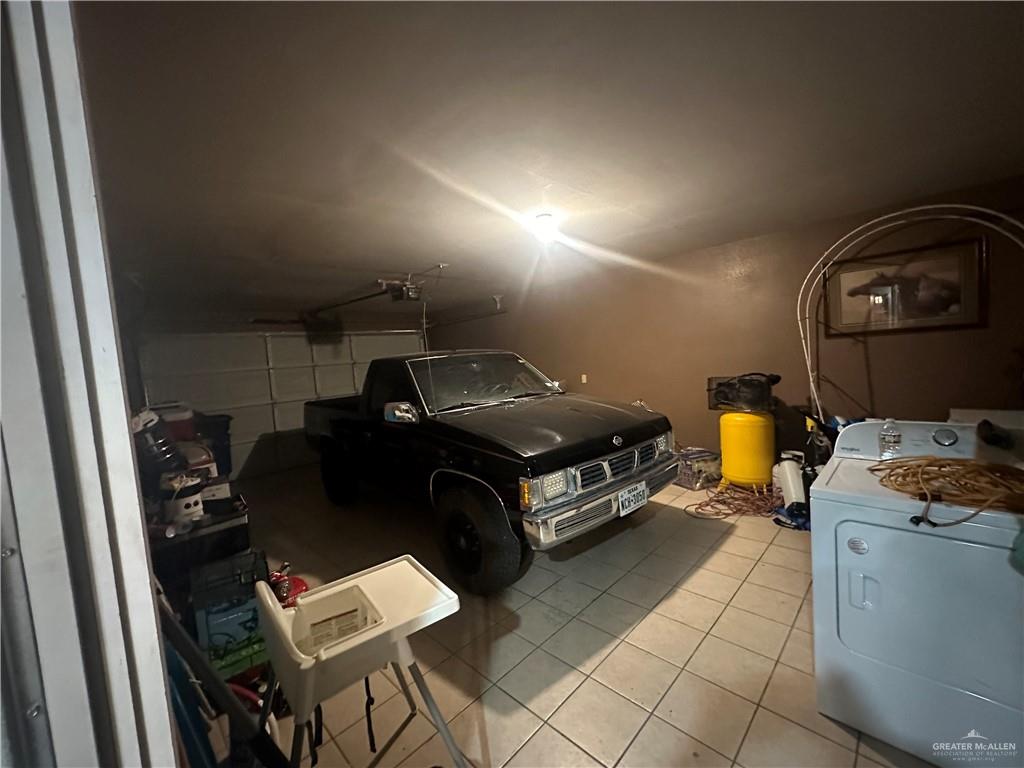 8200 Mars Lane Mission, TX 78574 - Photo 22 of 33 a car parked in a room