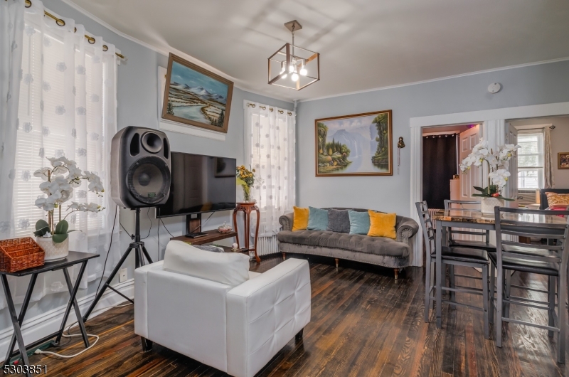 22 Sears Place Clifton, NJ 07011 - Photo 7 of 8 a living room with furniture and wooden floor