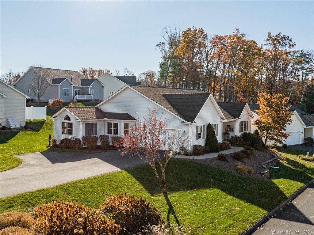 2 Watch Hill Road, Unit 2 Enfield, CT 06082 - Photo 1 of 1 a front view of a house with garden