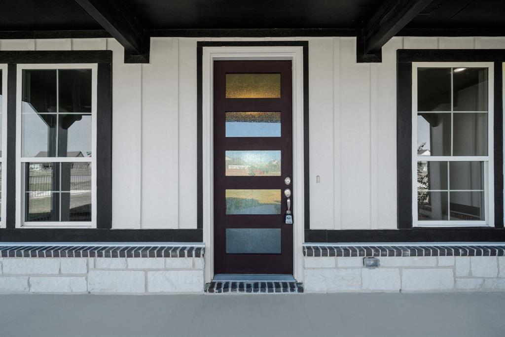 107 Red Clf Court Rhome, TX 76078 - Photo 5 of 34 Modern front door.