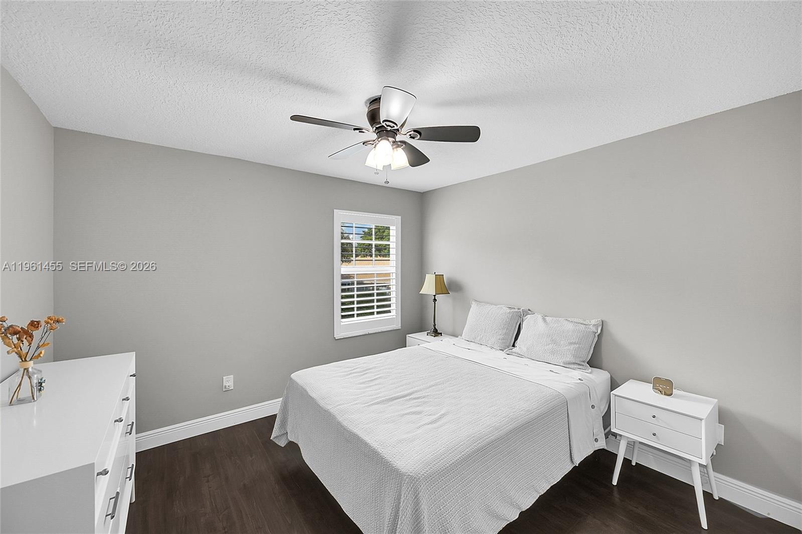 17317 Boca Club Boulevard, Unit 7 Boca Raton, FL 33487 - Photo 32 of 48 a bedroom with a bed and a window