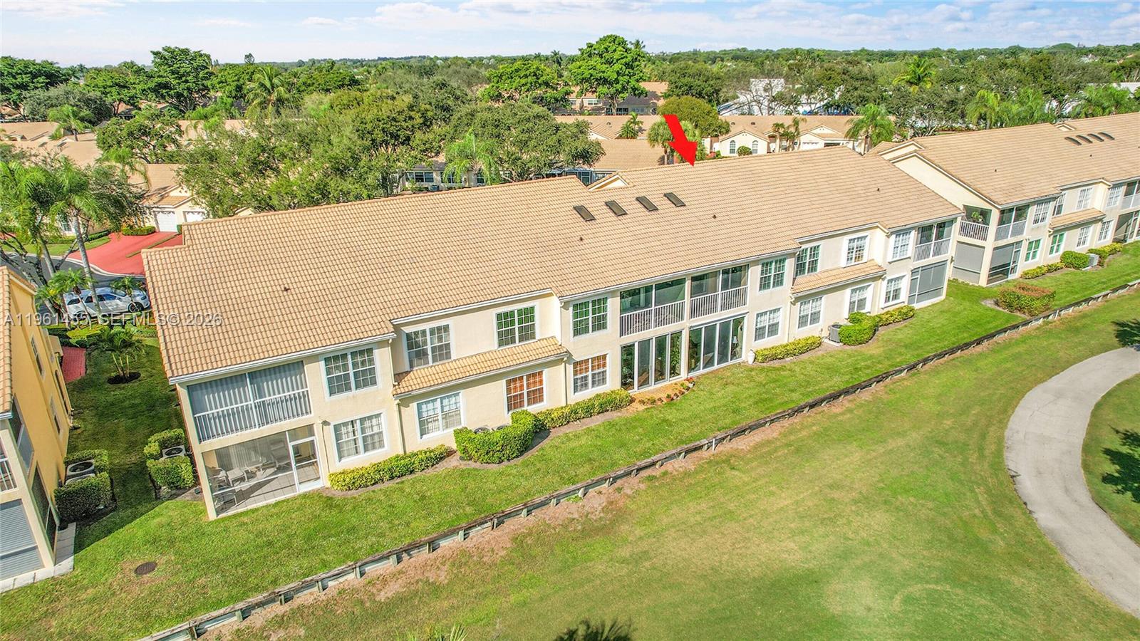 17317 Boca Club Boulevard, Unit 7 Boca Raton, FL 33487 - Photo 41 of 48 a view of building with yard