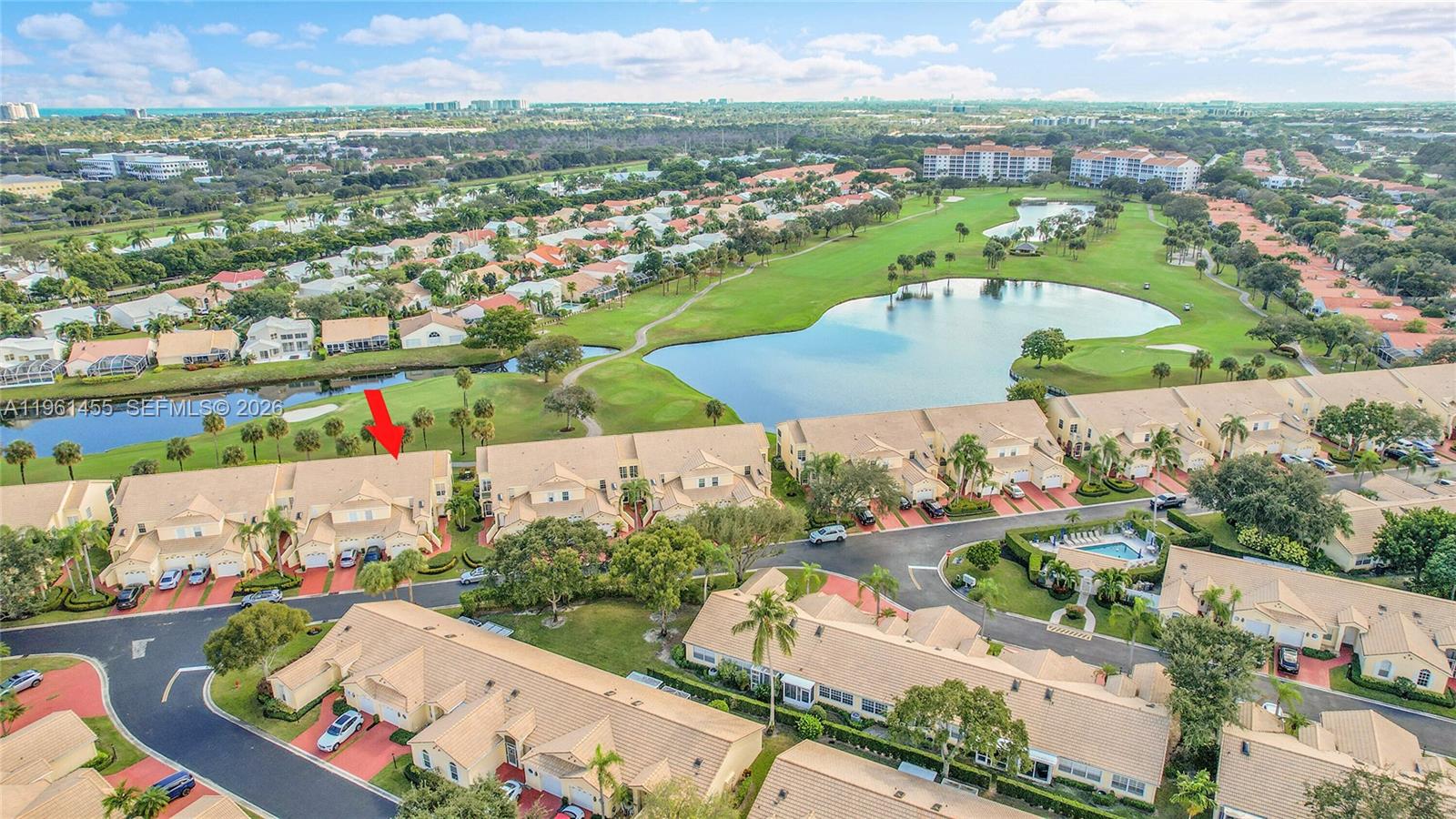 17317 Boca Club Boulevard, Unit 7 Boca Raton, FL 33487 - Photo 46 of 48 an aerial view of residential houses and outdoor space