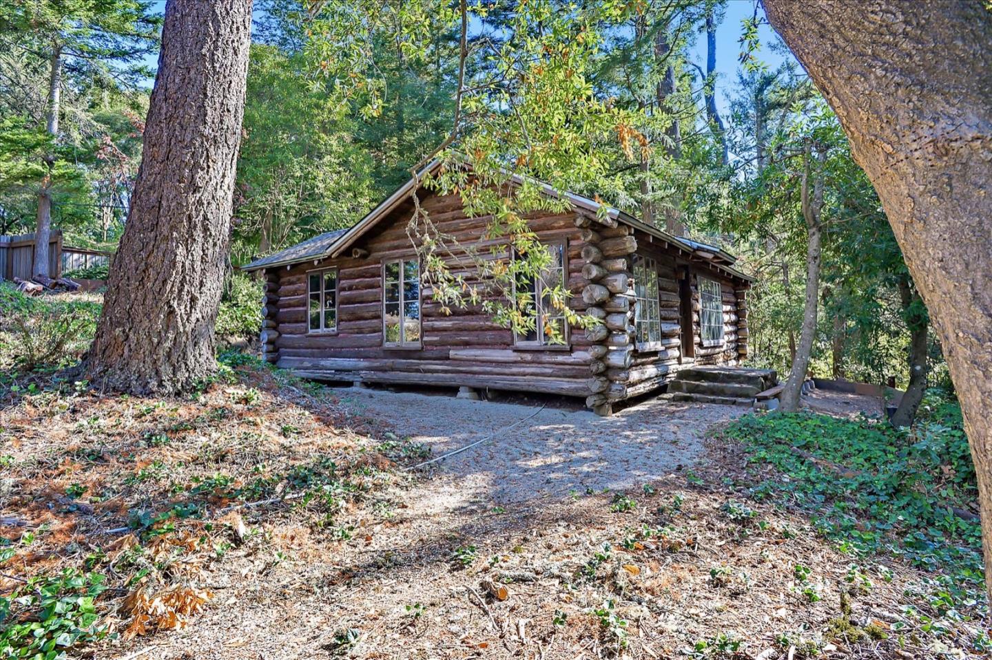 17 Skyline Drive Woodside, CA 94062 - Photo 11 of 15 a view of backyard with wooden fence and a large tree