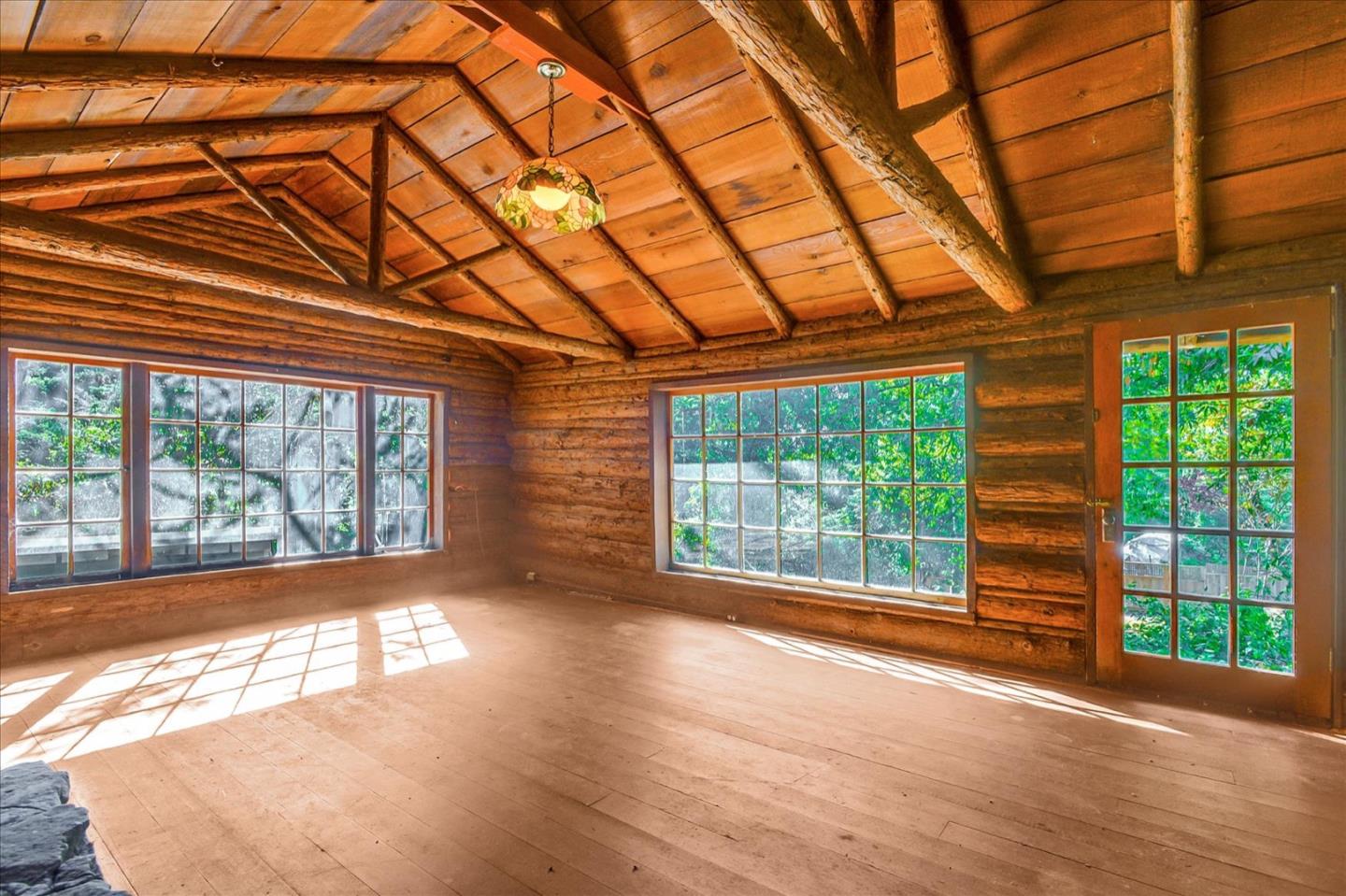 17 Skyline Drive Woodside, CA 94062 - Photo 3 of 15 a view of empty room with wooden floor and fan