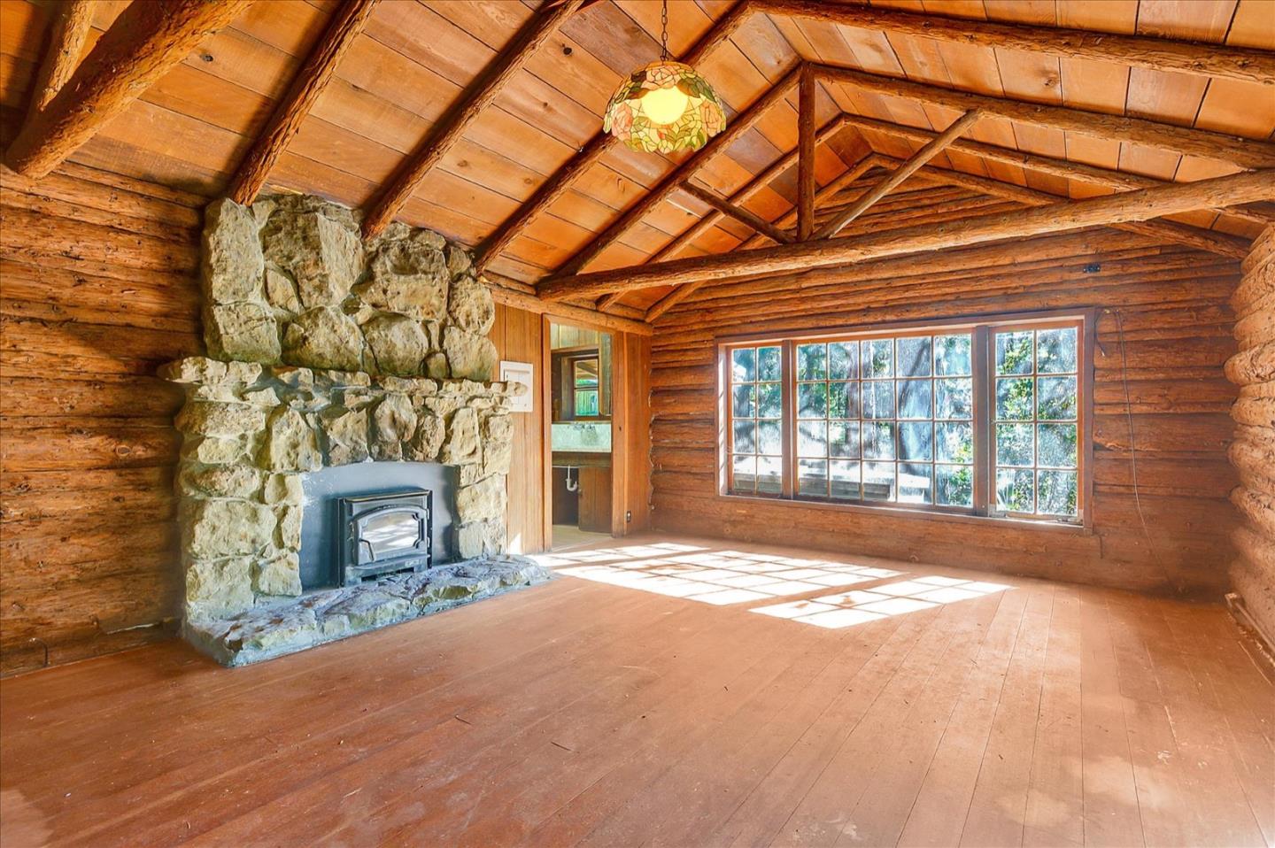 17 Skyline Drive Woodside, CA 94062 - Photo 8 of 15 a view of a fireplace in front of a house