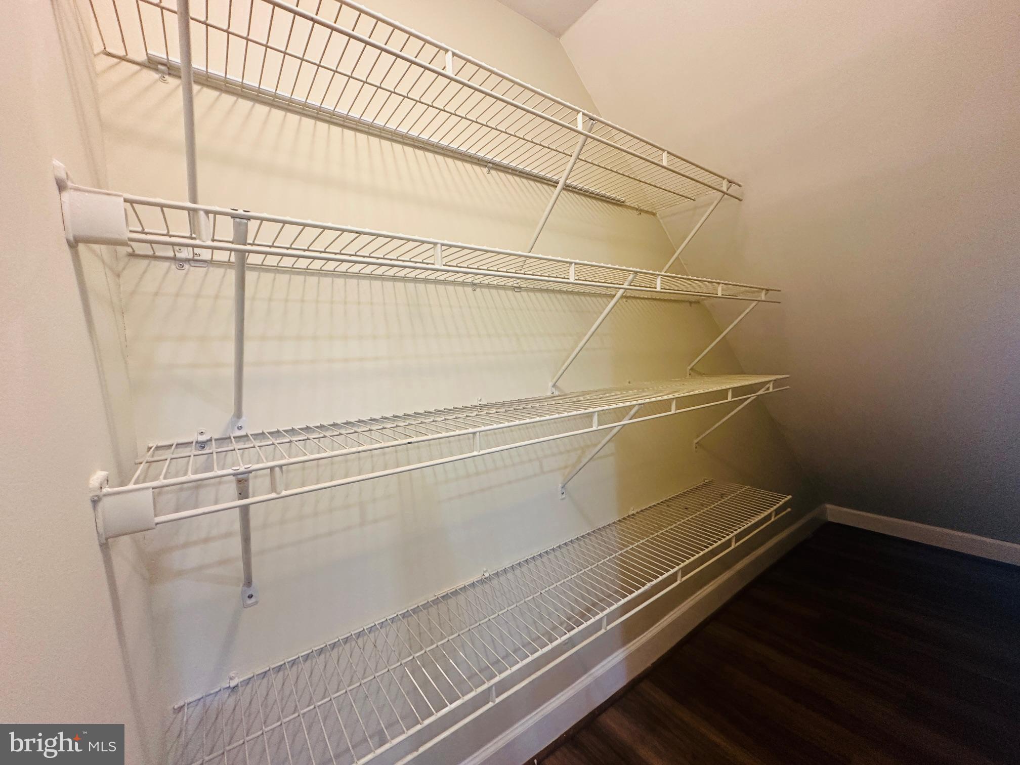 102 Hayloft Circle Sterling, VA 20164 - Photo 15 of 39 a view of a room with racks on the wall