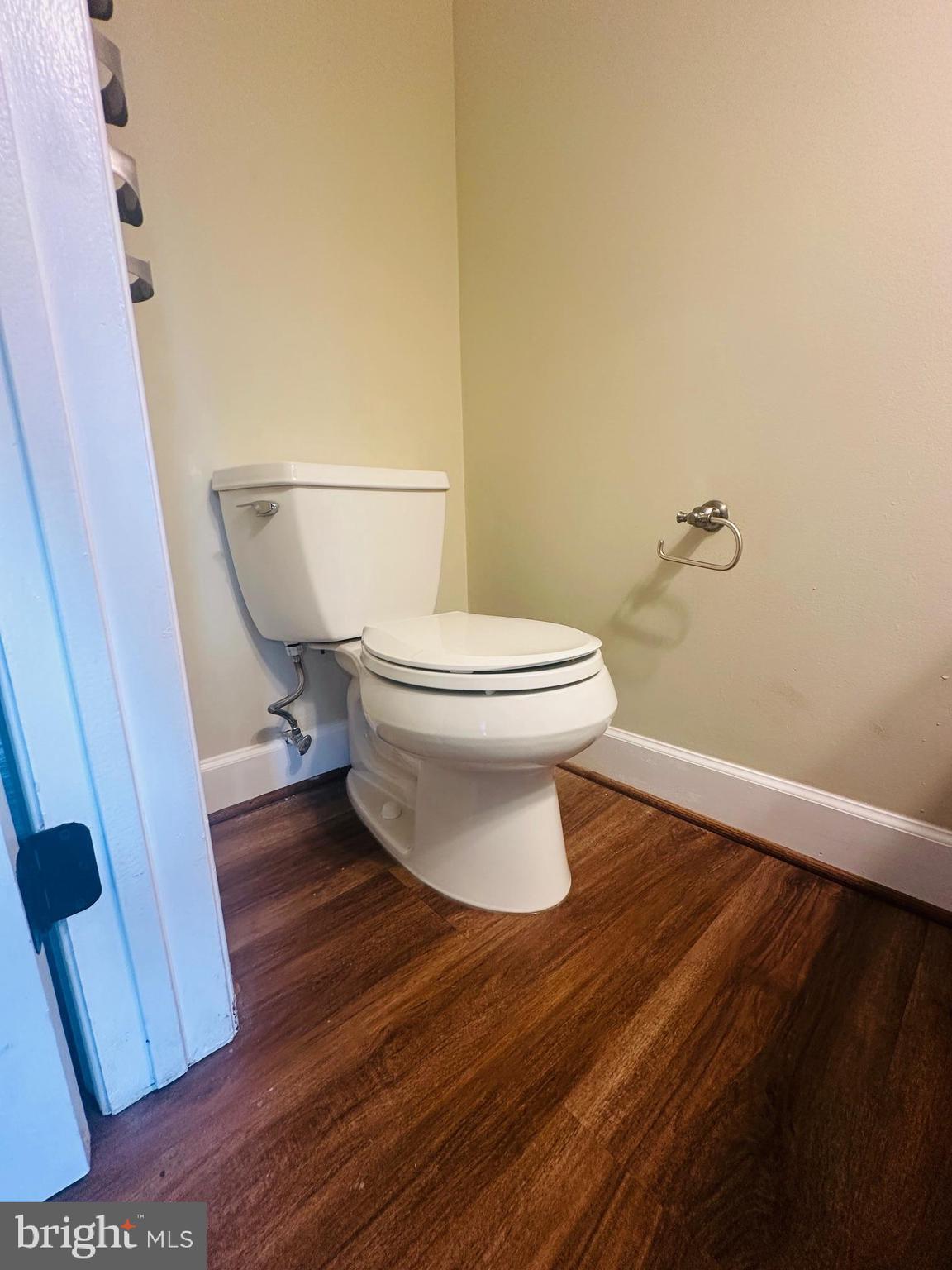 102 Hayloft Circle Sterling, VA 20164 - Photo 17 of 39 a white toilet sitting next to a bathroom sink