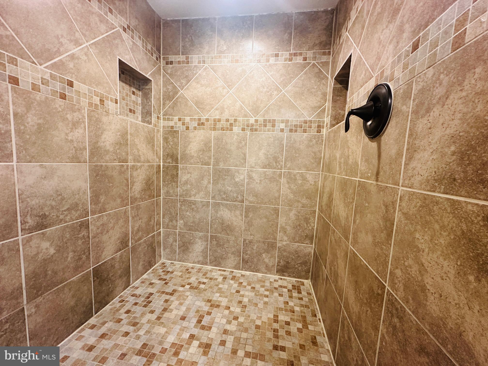102 Hayloft Circle Sterling, VA 20164 - Photo 23 of 39 a bathroom with a shower