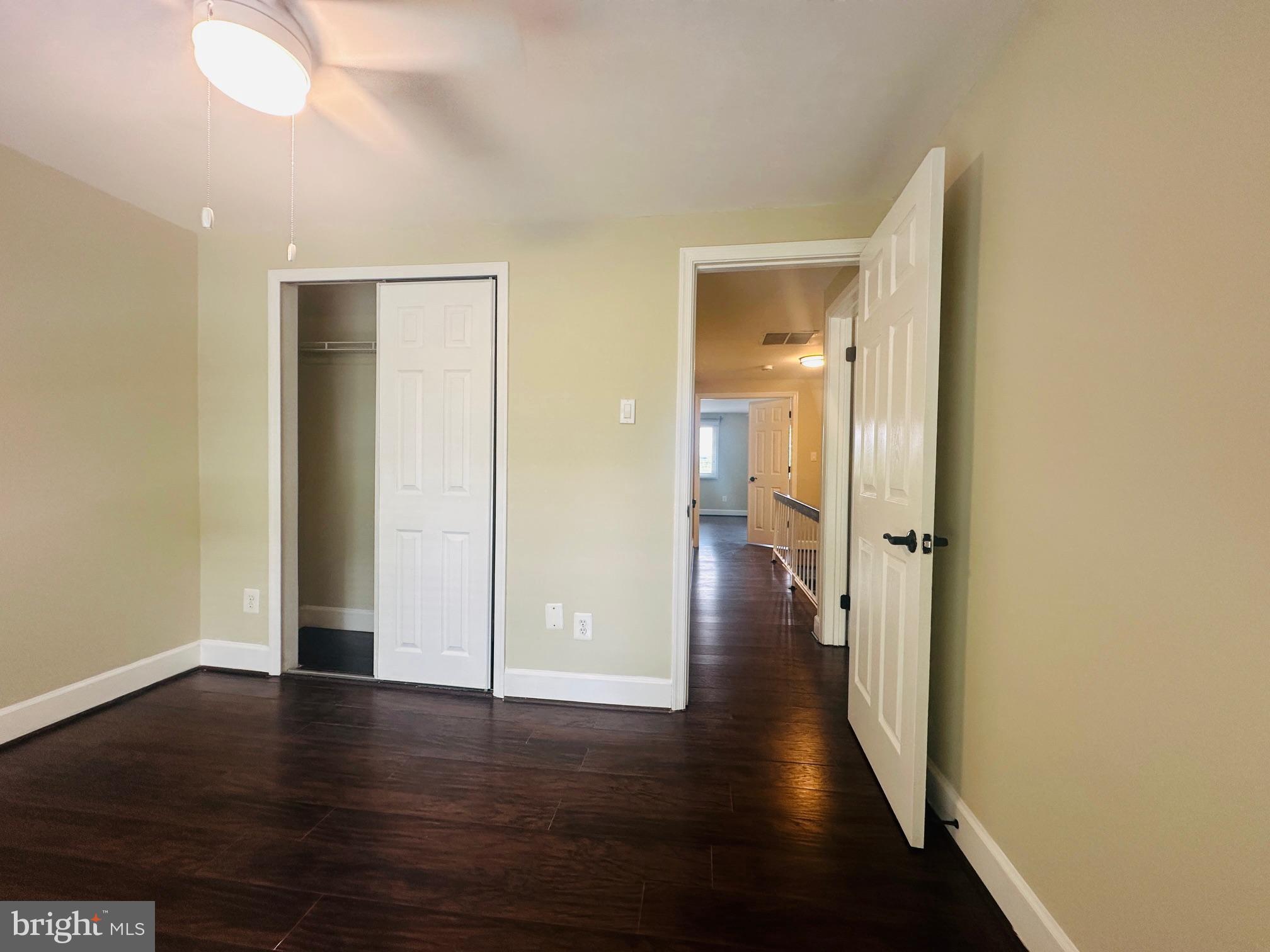 102 Hayloft Circle Sterling, VA 20164 - Photo 30 of 39 a view of a hallway with wooden floor