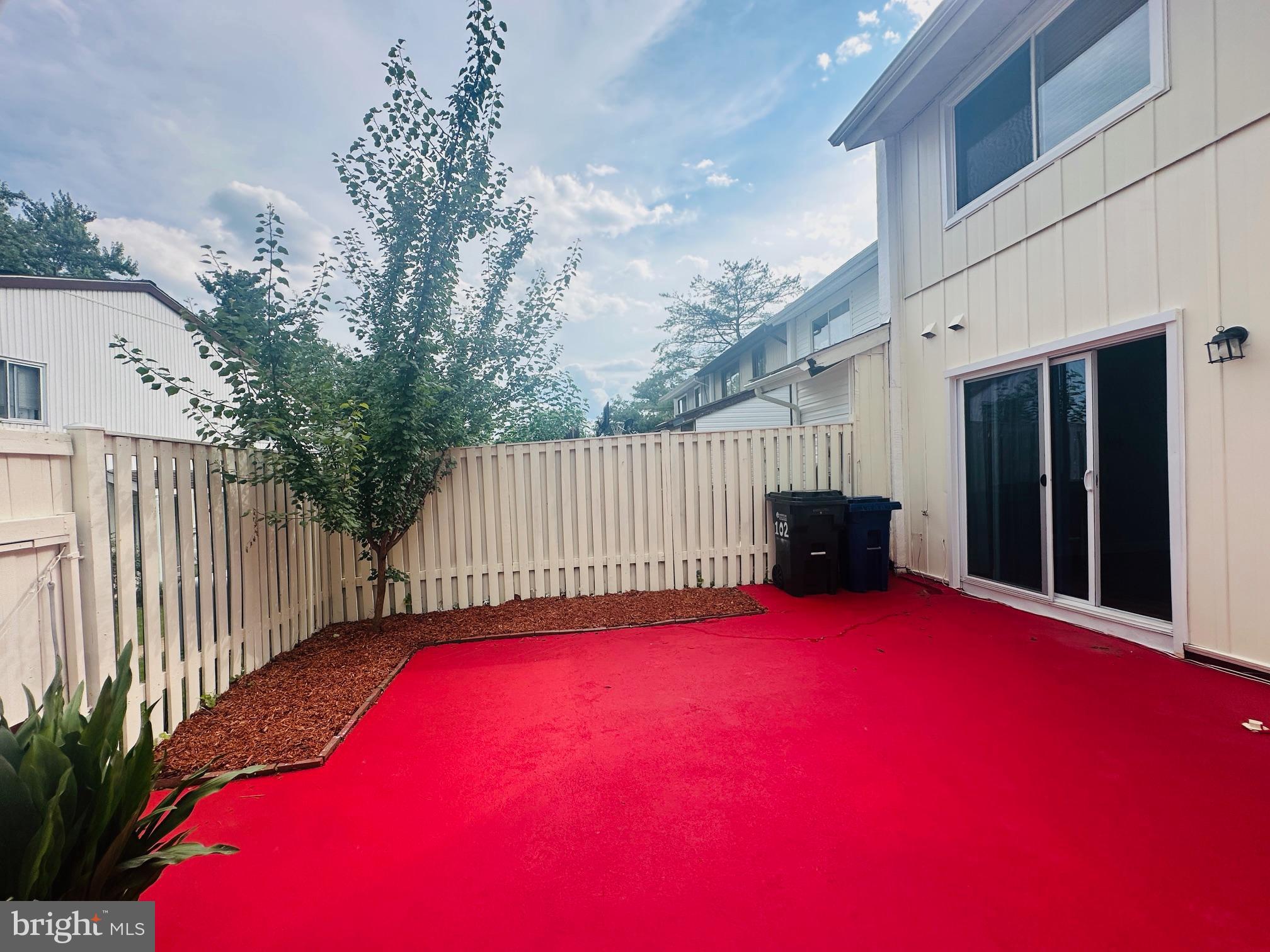102 Hayloft Circle Sterling, VA 20164 - Photo 37 of 39 a view of a balcony with floor to ceiling window and stairs