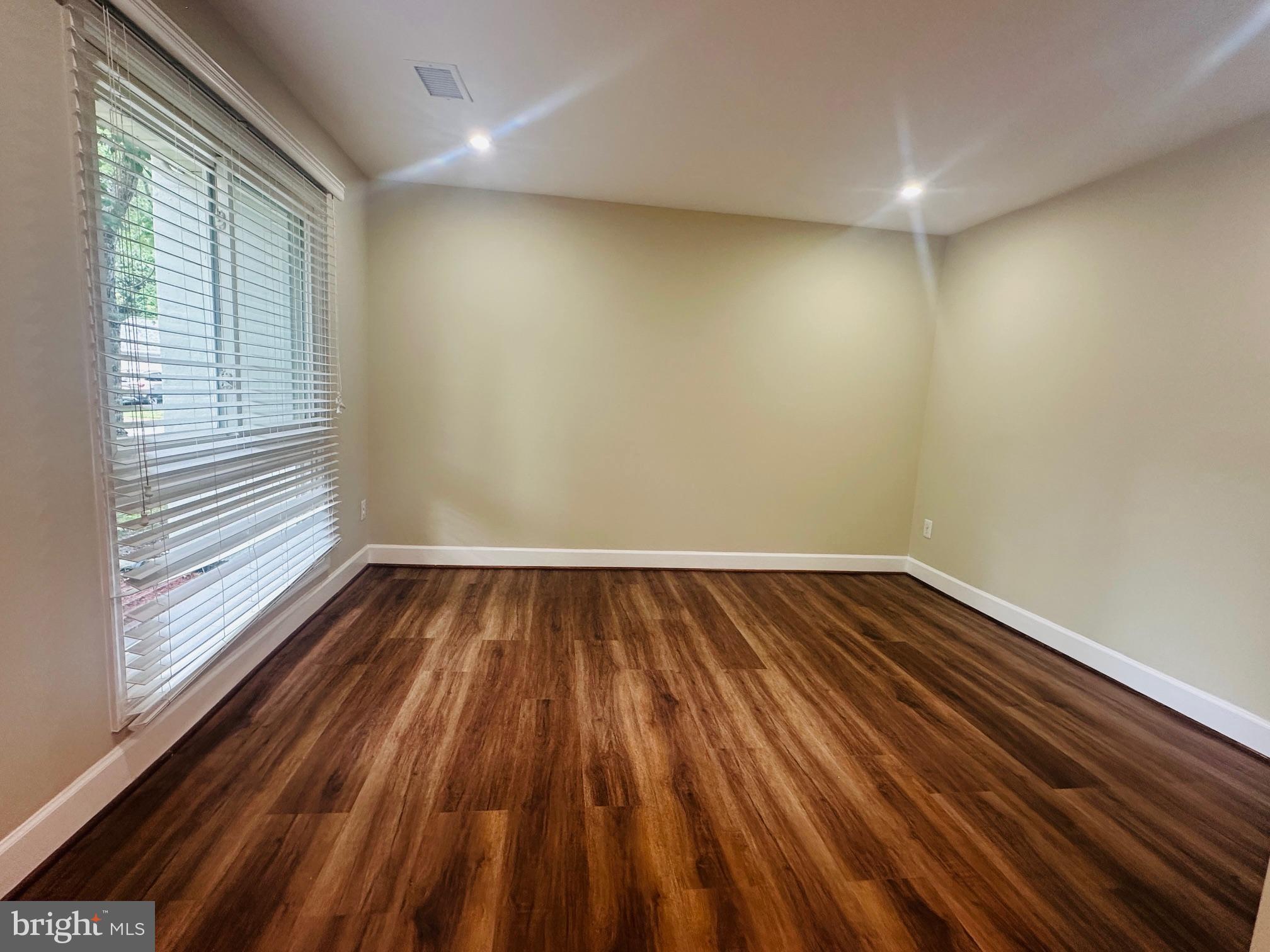 102 Hayloft Circle Sterling, VA 20164 - Photo 4 of 39 a view of wooden floor in a room